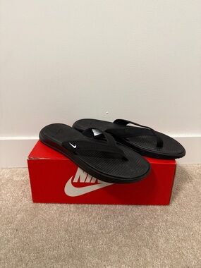 Nike Black Men's Thong Flip Flops with White Swoosh